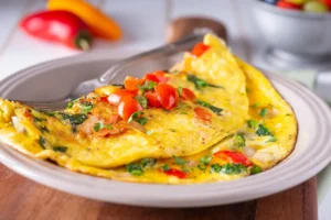 Como fazer um omelete simples de frigideira para o café da manhã